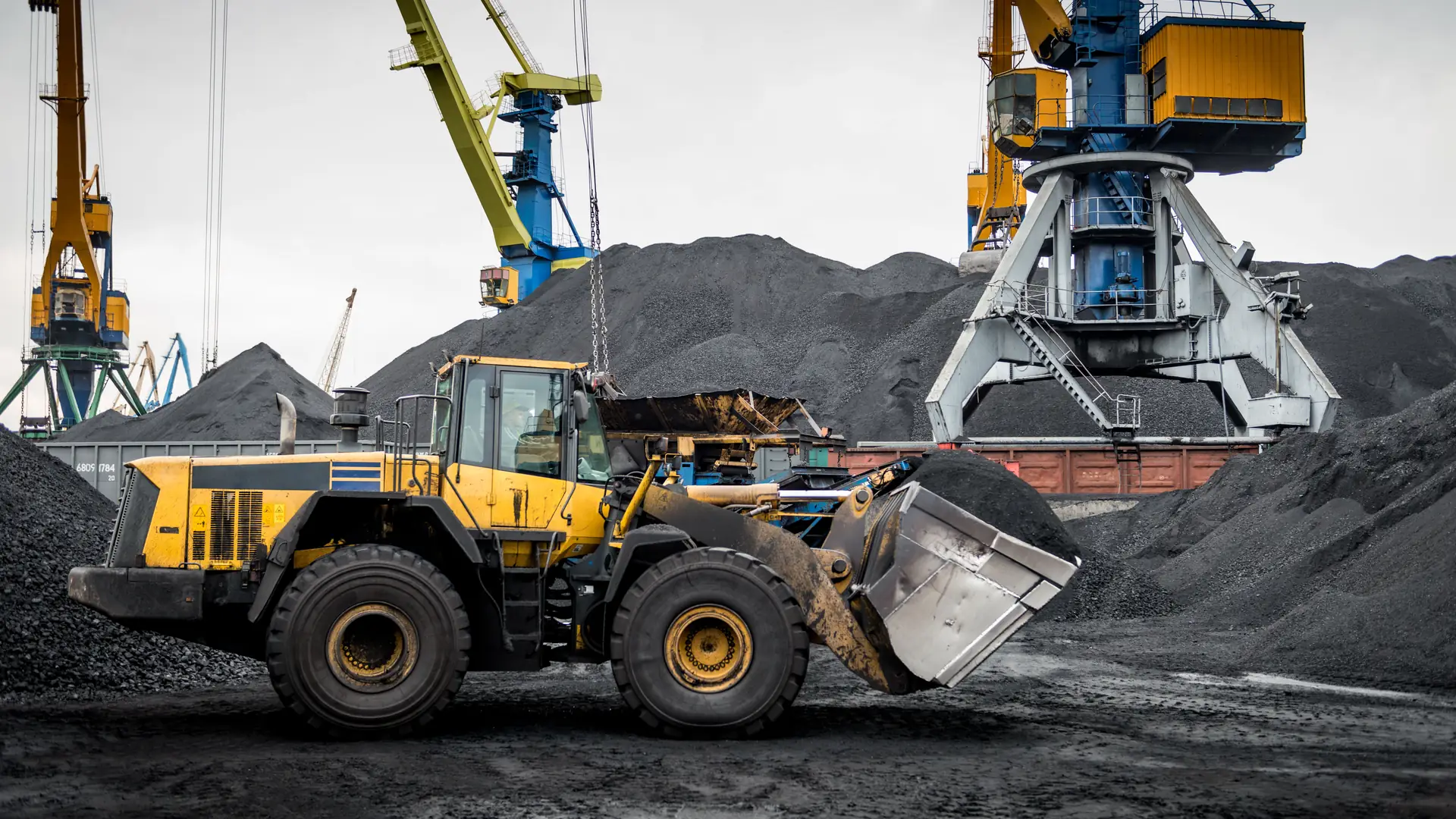 A wheel loader working a coal handling yard